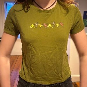 Green crop top with frogs and other whimsy stuff on it